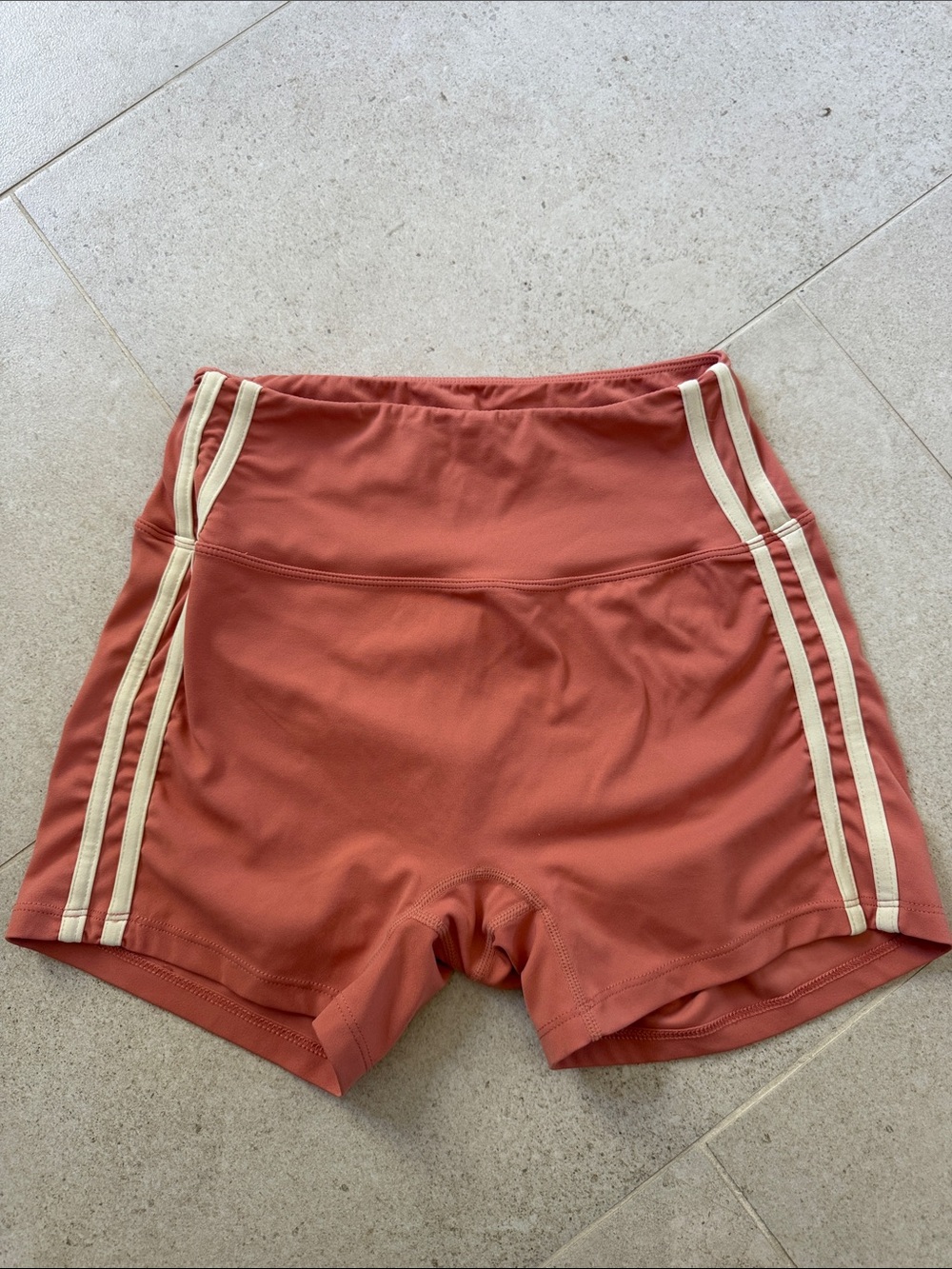High-Waist Rust Athletic Shorts with Cream Side Stripes